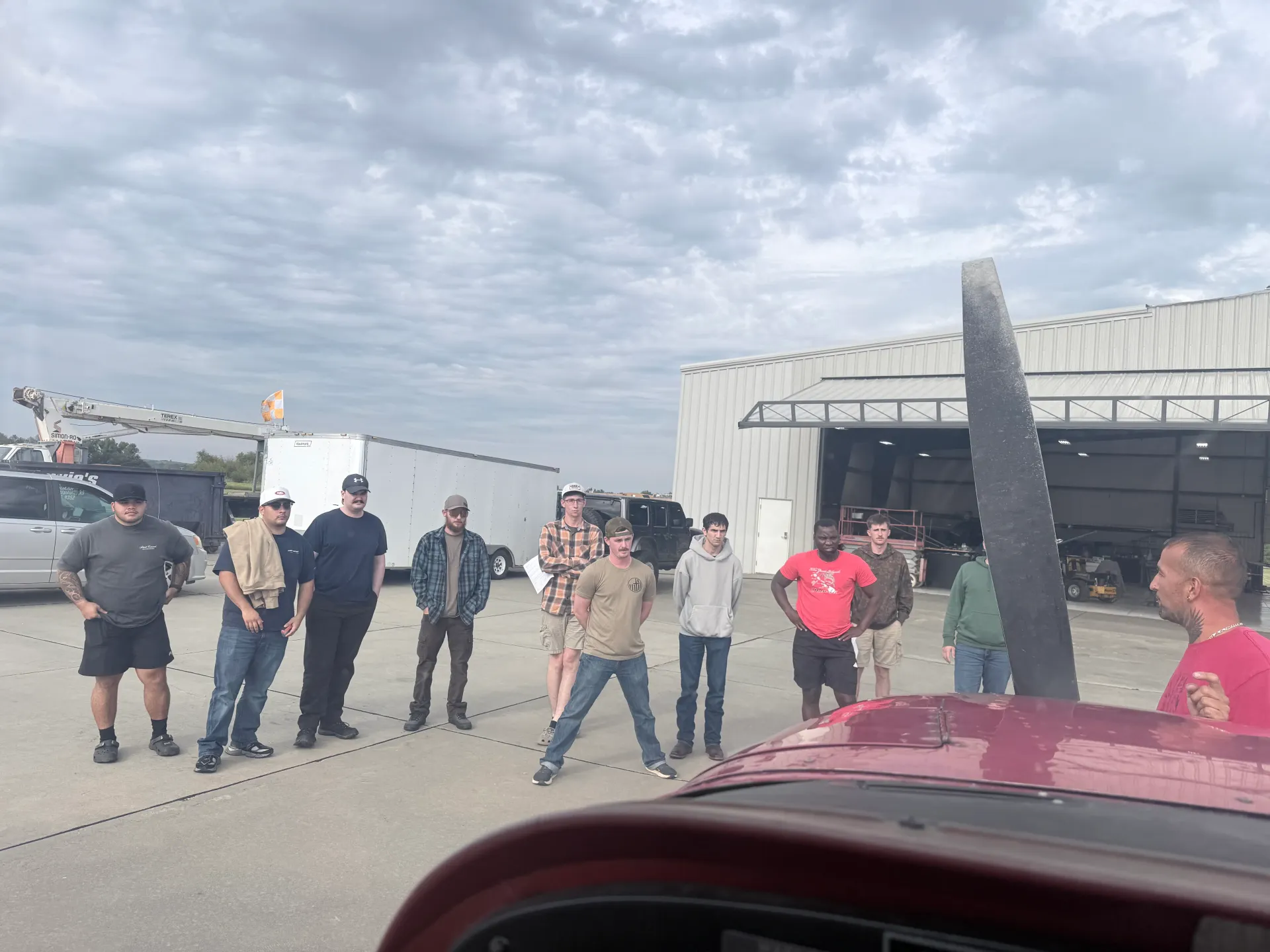A&P prep group gathered outside a hangar at Freeman Field