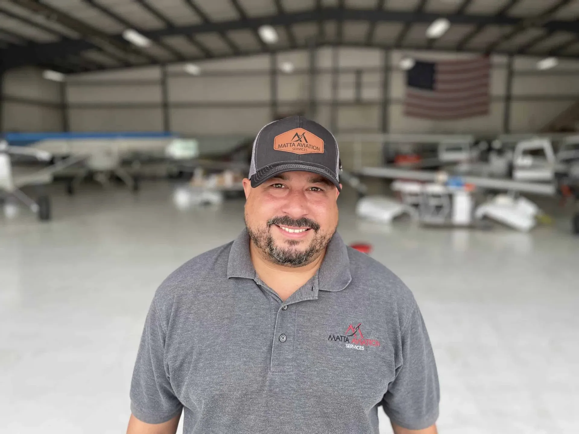 Eduardo Matta in a Matta Aviation Services hangar